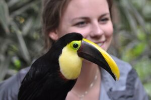 student with a tucan costa rica