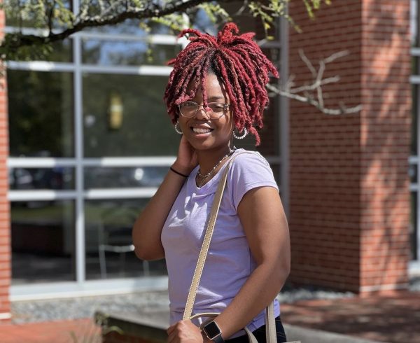 Grace'Lyn Preshon, social work student at UIndy, poses in front of Schwitzer Student Center