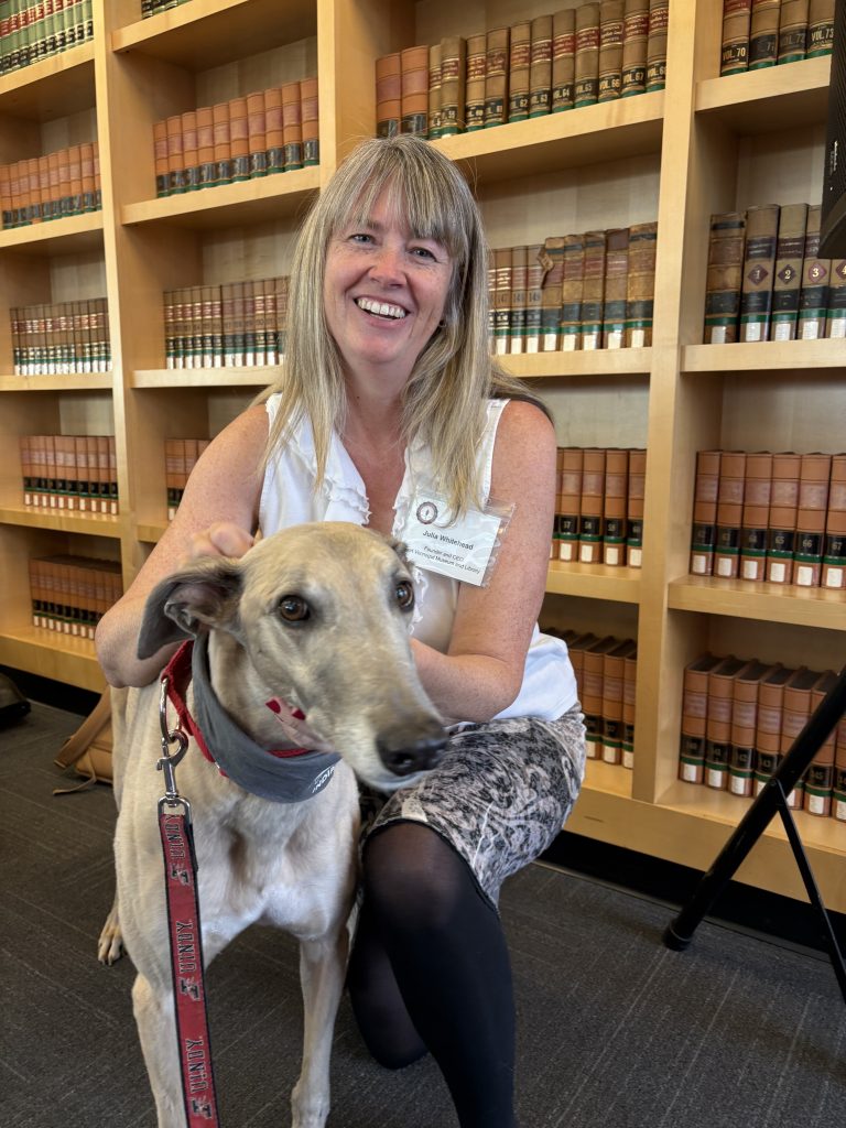 Photo of Julia Whitehead with Grady the Greyhound