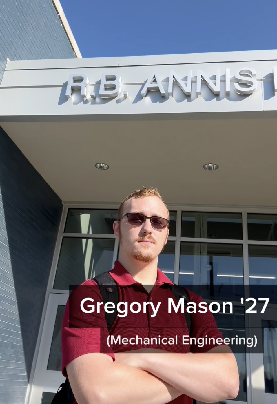 Photo of Gregory Mason in front of R.B. Annis Hall